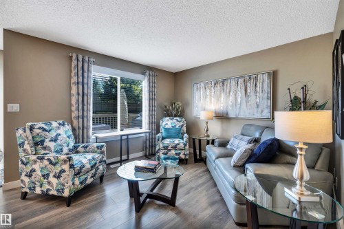 5033 Andison Close Sw, Edmonton, AB - Indoor Photo Showing Living Room