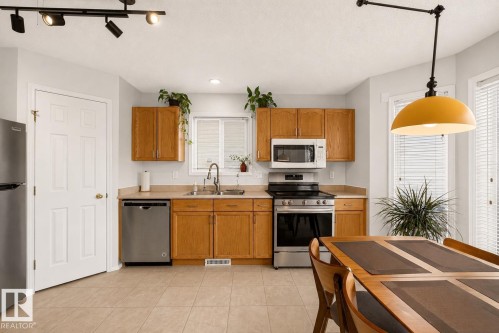14823 47 Street Nw, Edmonton, AB - Indoor Photo Showing Kitchen With Double Sink
