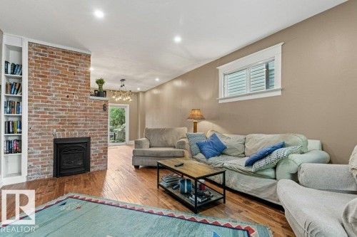 10547 126 Street Nw, Edmonton, AB - Indoor Photo Showing Living Room With Fireplace