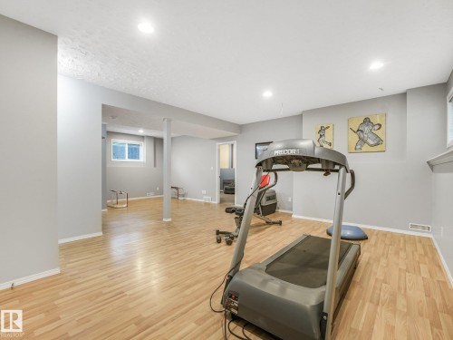 4409 58 Street, Beaumont, AB - Indoor Photo Showing Gym Room
