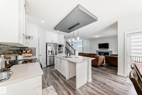 7035 Chivers Loop Sw, Edmonton, AB - Indoor Photo Showing Kitchen With Double Sink