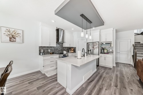 7035 Chivers Loop Sw, Edmonton, AB - Indoor Photo Showing Kitchen With Upgraded Kitchen