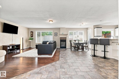 1312 116 Street Nw, Edmonton, AB - Indoor Photo Showing Living Room With Fireplace