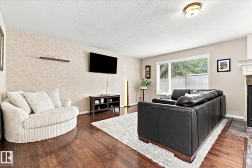 1312 116 Street Nw, Edmonton, AB - Indoor Photo Showing Living Room With Fireplace