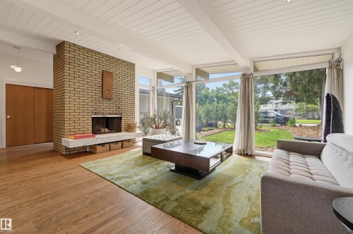 13808 Buena Vista Road Nw, Edmonton, AB - Indoor Photo Showing Living Room With Fireplace