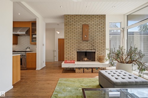 13808 Buena Vista Road Nw, Edmonton, AB - Indoor Photo Showing Living Room With Fireplace