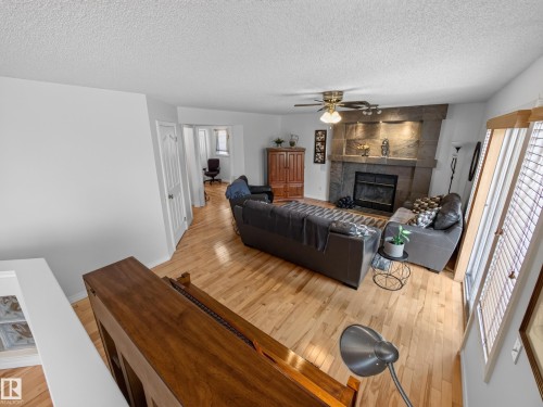 1404 Falconer Road Nw, Edmonton, AB - Indoor Photo Showing Living Room With Fireplace