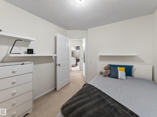 1404 Falconer Road Nw, Edmonton, AB - Indoor Photo Showing Bedroom