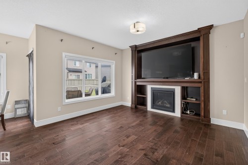 Wood-finish flooring throughout - 7014 Chivers Loop Sw, Edmonton, AB 
