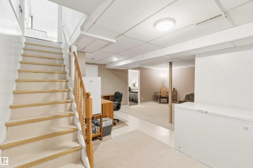 Lower level featuring carpeted flooring and recessed lighting - 5208 105 Street Nw, Edmonton, AB - Indoor Photo Showing Other Room