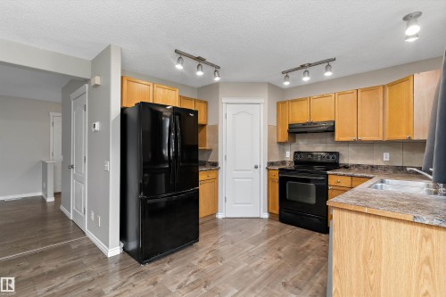 7847 7 Avenue Sw, Edmonton, AB - Indoor Photo Showing Kitchen With Double Sink
