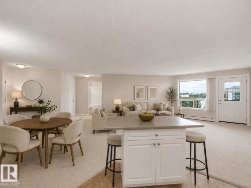 Open-concept living space with light-toned carpeting and neutral wall colors - #1418 330 Clareview Station Dr Nw, Edmonton, AB - Indoor