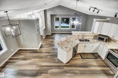 21243 91 Avenue Nw, Edmonton, AB - Indoor Photo Showing Kitchen With Double Sink