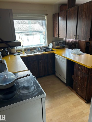 9612 75A Street Nw, Edmonton, AB - Indoor Photo Showing Kitchen With Double Sink