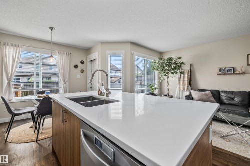 70 Woodbridge Link, Fort Saskatchewan, AB - Indoor Photo Showing Kitchen With Double Sink