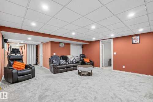 Recessed lighting illuminates the carpeted flooring and painted walls - 923 174St Sw, Edmonton, AB 
