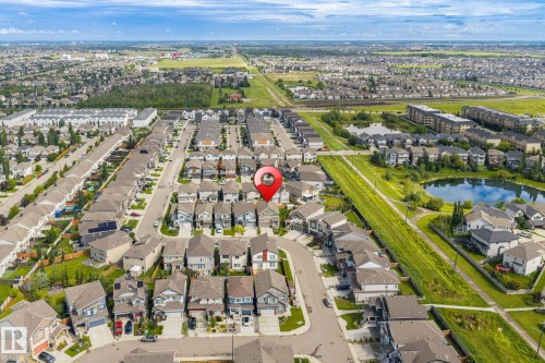 Residential neighborhood setting featuring multiple single-family homes and townhouses - 923 174St Sw, Edmonton, AB 