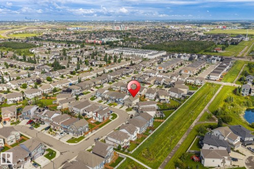 Aerial perspective showcasing a residential neighborhood with varied architectural styles - 923 174St Sw, Edmonton, AB 