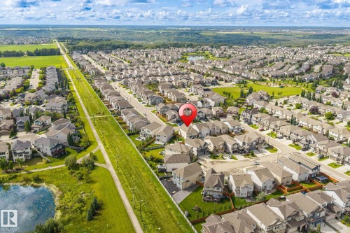 Residential neighborhood with a linear green space and a pond - 923 174St Sw, Edmonton, AB 