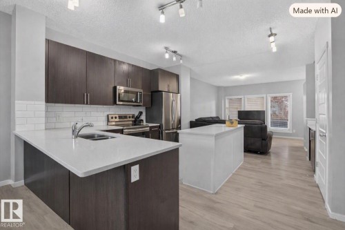 2619 Chokecherry Lane Sw, Edmonton, AB - Indoor Photo Showing Kitchen With Double Sink With Upgraded Kitchen