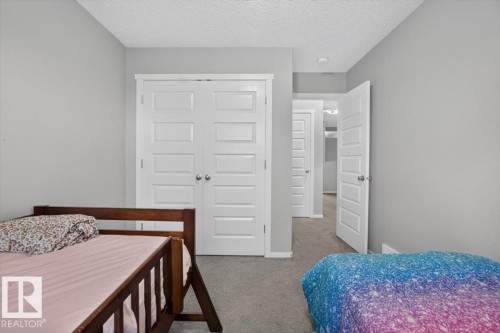 2619 Chokecherry Lane Sw, Edmonton, AB - Indoor Photo Showing Bedroom