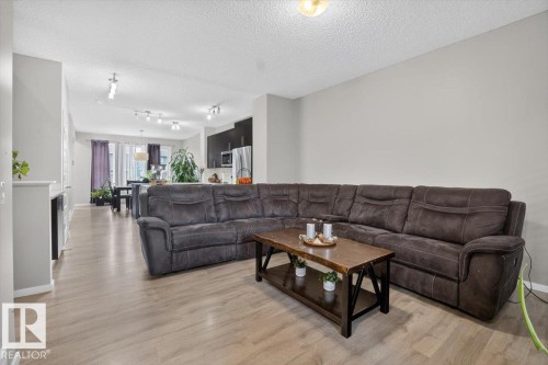 2619 Chokecherry Lane Sw, Edmonton, AB - Indoor Photo Showing Living Room