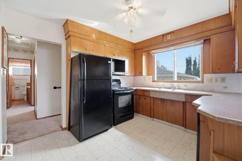 13303 Delwood Road Nw, Edmonton, AB - Indoor Photo Showing Kitchen With Double Sink