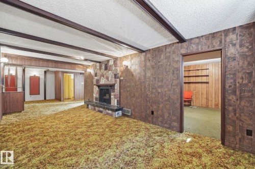 13303 Delwood Road Nw, Edmonton, AB - Indoor Photo Showing Other Room With Fireplace