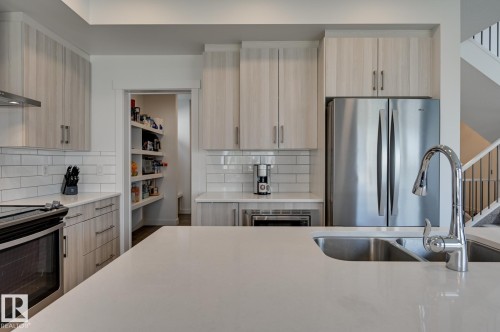 15628 15 Avenue Sw, Edmonton, AB - Indoor Photo Showing Kitchen With Double Sink With Upgraded Kitchen