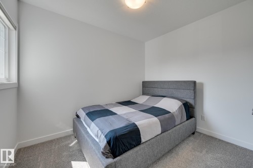 15628 15 Avenue Sw, Edmonton, AB - Indoor Photo Showing Bedroom