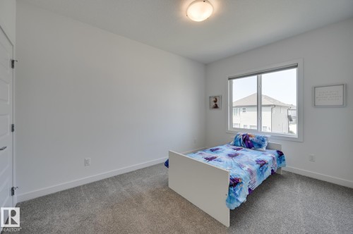 15628 15 Avenue Sw, Edmonton, AB - Indoor Photo Showing Bedroom