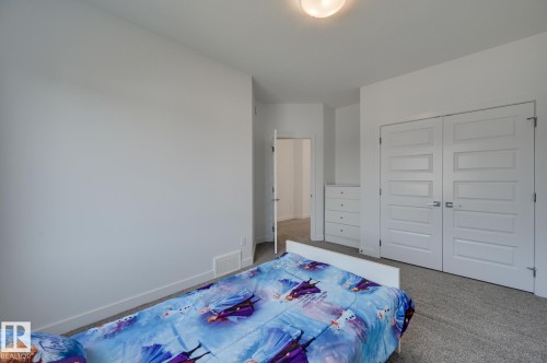 15628 15 Avenue Sw, Edmonton, AB - Indoor Photo Showing Bedroom