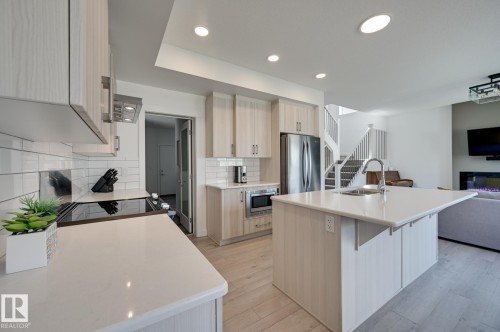 15628 15 Avenue Sw, Edmonton, AB - Indoor Photo Showing Kitchen With Upgraded Kitchen