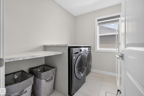 5727 Keeping Crescent Sw, Edmonton, AB - Indoor Photo Showing Laundry Room