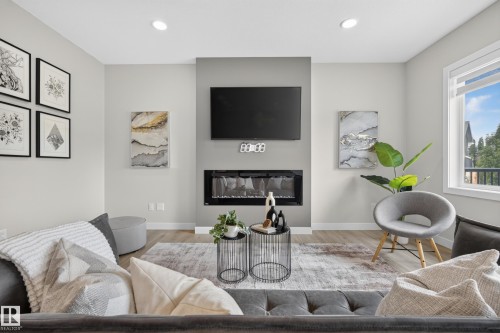 5727 Keeping Crescent Sw, Edmonton, AB - Indoor Photo Showing Living Room With Fireplace