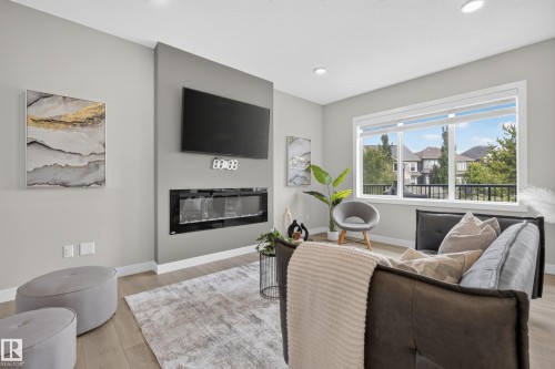 5727 Keeping Crescent Sw, Edmonton, AB - Indoor Photo Showing Living Room With Fireplace