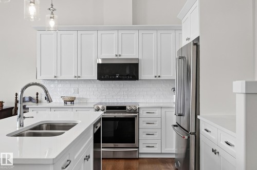 50 Heatherglen Drive, Spruce Grove, AB - Indoor Photo Showing Kitchen With Double Sink With Upgraded Kitchen