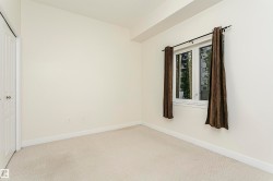Neutral wall tones, white trim, and light-colored carpeting - 