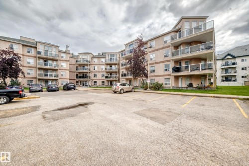 Multi-story building featuring private balconies with glass railings - #331 9704 174 St Nw, Edmonton, AB 