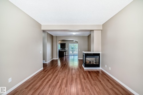 #4 5102 30 Av, Beaumont, AB - Indoor With Fireplace