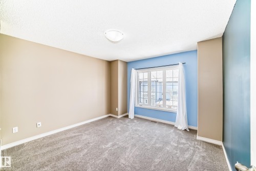 #4 5102 30 Av, Beaumont, AB - Indoor Photo Showing Other Room