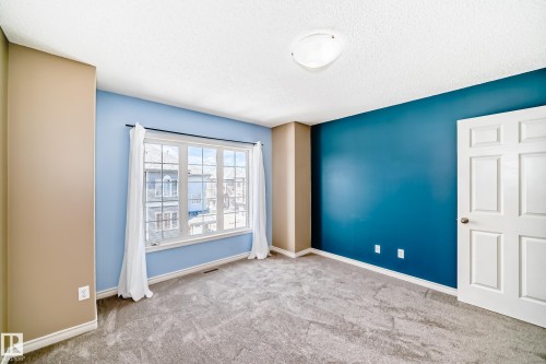 #4 5102 30 Av, Beaumont, AB - Indoor Photo Showing Other Room