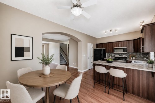 #4 5102 30 Av, Beaumont, AB - Indoor Photo Showing Dining Room
