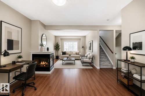 #4 5102 30 Av, Beaumont, AB - Indoor With Fireplace