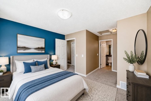 #4 5102 30 Av, Beaumont, AB - Indoor Photo Showing Bedroom