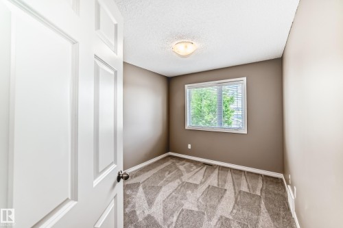 #4 5102 30 Av, Beaumont, AB - Indoor Photo Showing Other Room