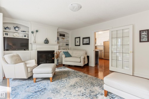 7 Quesnell Crescent Nw, Edmonton, AB - Indoor Photo Showing Living Room With Fireplace