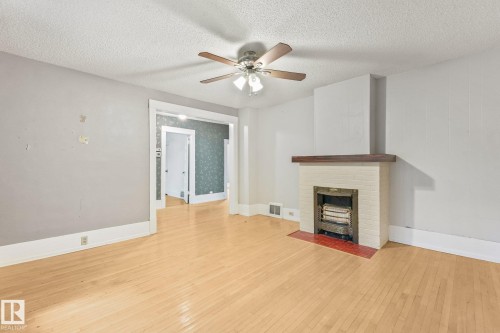 9824 91 Avenue Nw, Edmonton, AB - Indoor With Fireplace