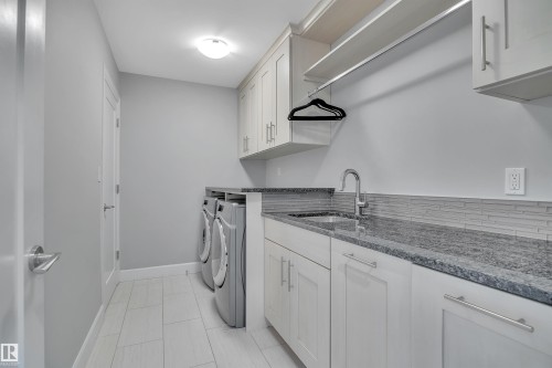 4510 Wingfield Bay Nw, Edmonton, AB - Indoor Photo Showing Laundry Room
