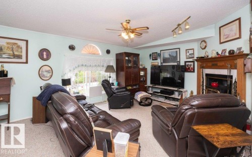 4903A 47 Avenue, Rural Westlock County, AB - Indoor Photo Showing Living Room With Fireplace